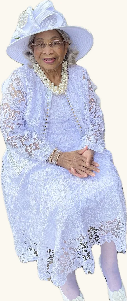 Missionary Katherine Cash Griffey seated in a white lace gown and a wide-brimmed white hat.