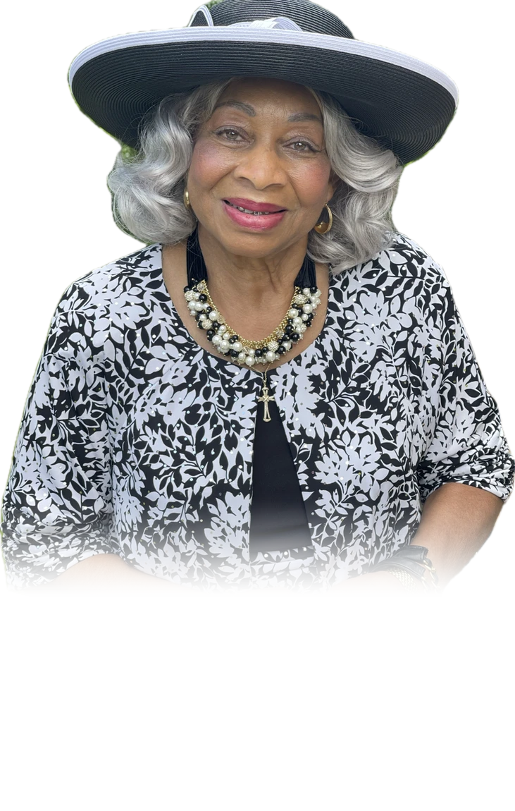 Missionary Katherine Cash Griffey in a black and white patterned jacket and a wide-brimmed hat.